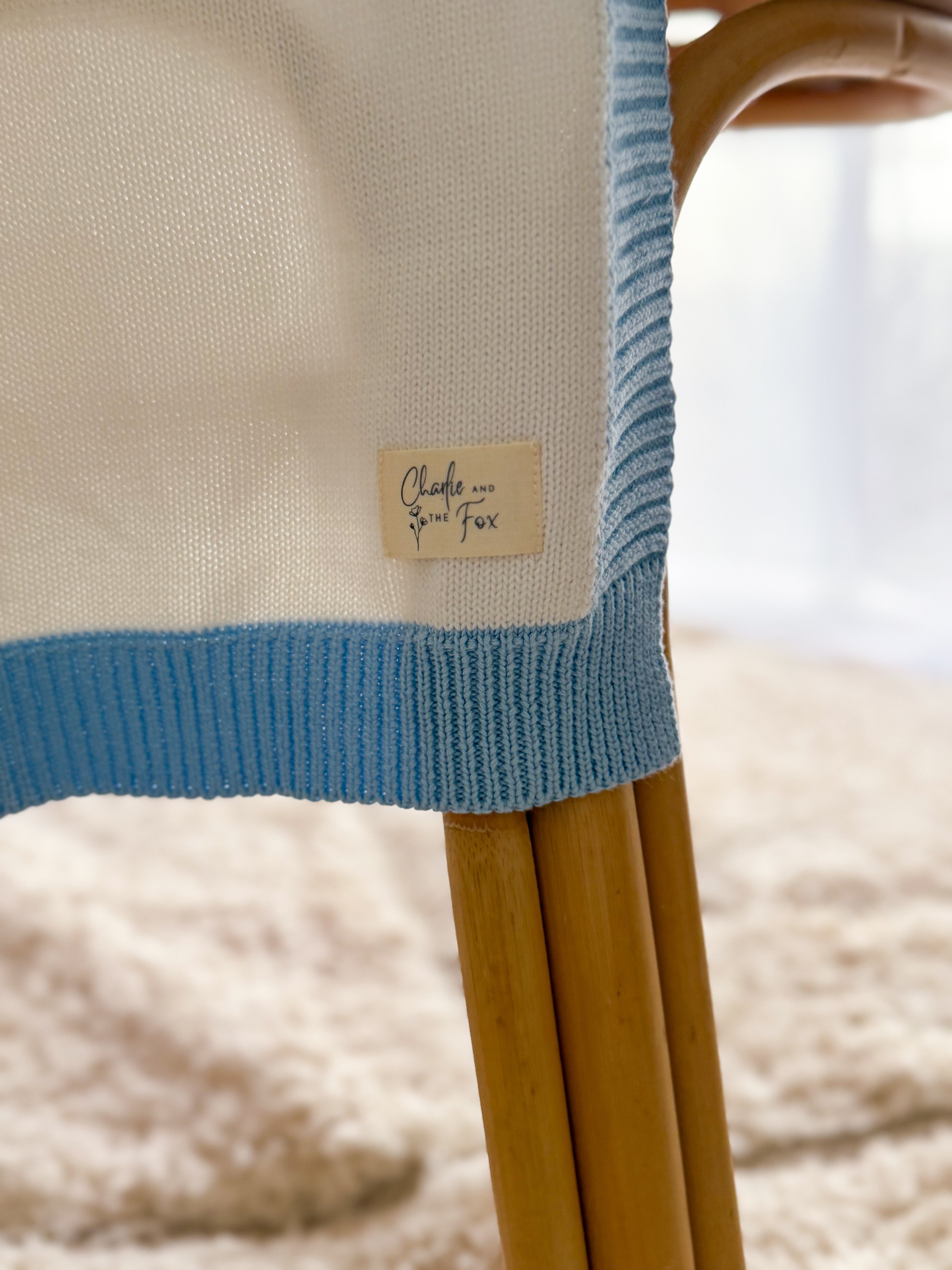 White Blanket with Blue Trim