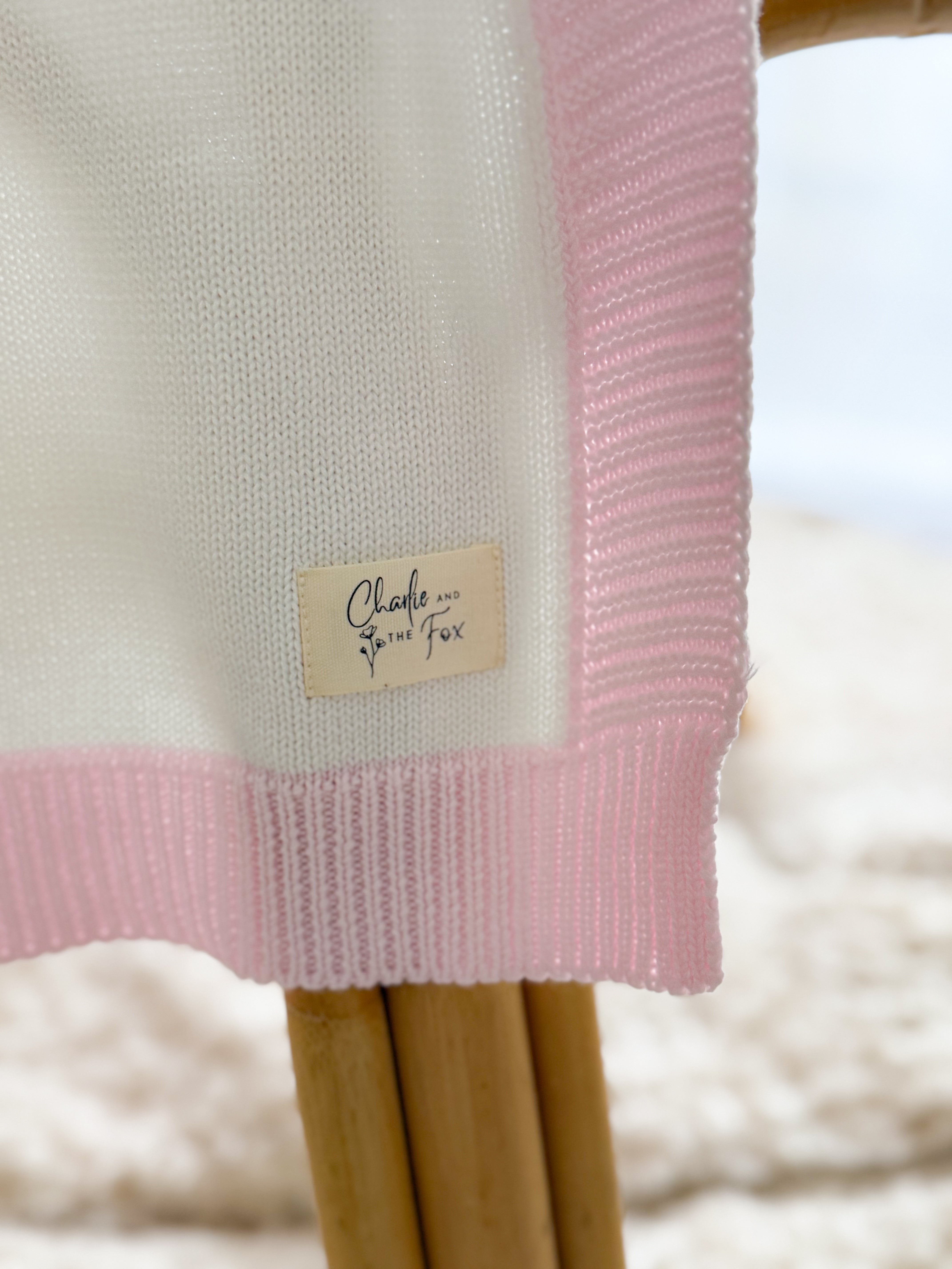 White Blanket with Pink Trim